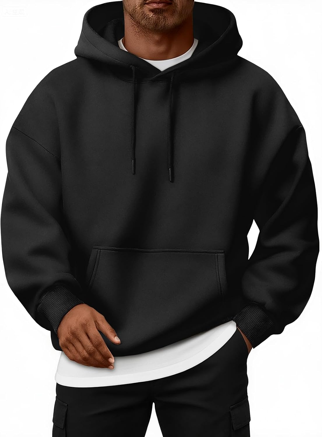 Oversized Fleece-Lined Pullover Hoodie – Black hoodie worn by a male model with drawstrings and kangaroo pocket