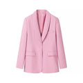 Soft pink tailored blazer in smooth fabric with a shawl lapel, single-button closure, and front flap pockets.