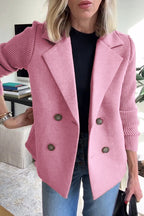 Pink wool-blend double-breasted blazer featuring contrasting ribbed-knit sleeves and a tailored, structured fit.