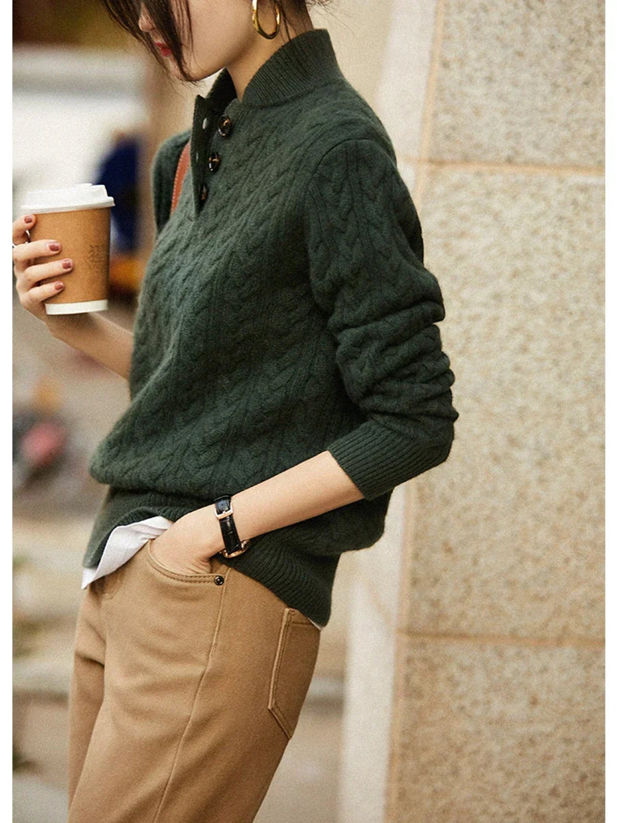 Dark green cable-knit wool blend henley sweater with a buttoned stand collar and slim, textured fit.