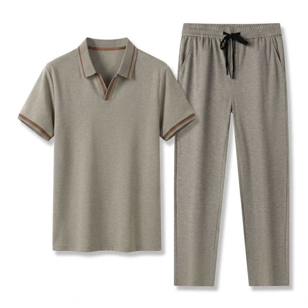 Men's cream short-sleeve polo shirt paired with matching drawstring pants displayed on a white background.