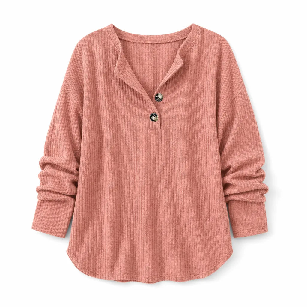 Dusty rose ribbed knit sweater featuring a relaxed fit, half-button placket, and long sleeves with ribbed cuffs.