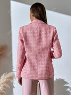 Pink tweed double-breasted blazer with a tailored fit, notched lapels, and textured woven fabric seen from the back.