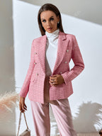 Pink double-breasted tweed blazer with notched lapels and decorative buttons, featuring a tailored, contoured fit.