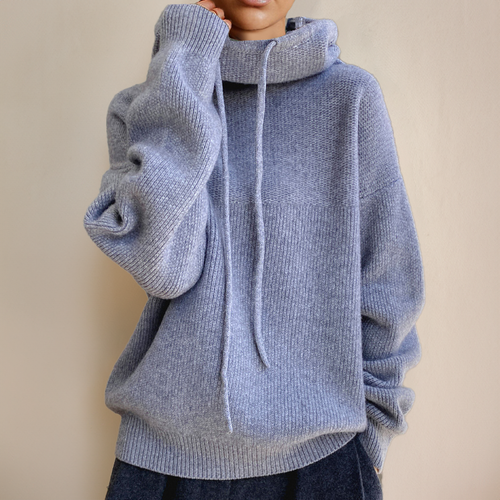 Periwinkle blue oversized hooded sweater in chunky ribbed knit with dropped shoulders and a tonal drawstring.