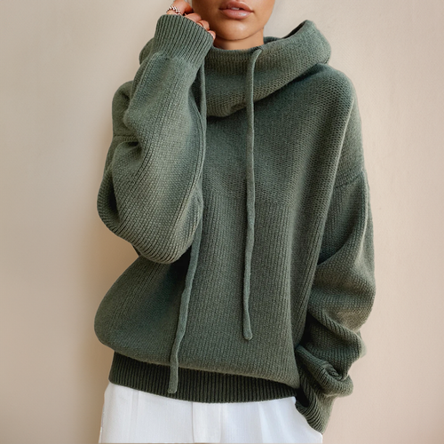 Olive green chunky ribbed knit hooded sweater with a relaxed, oversized fit, dropped shoulders, and drawstring hood.