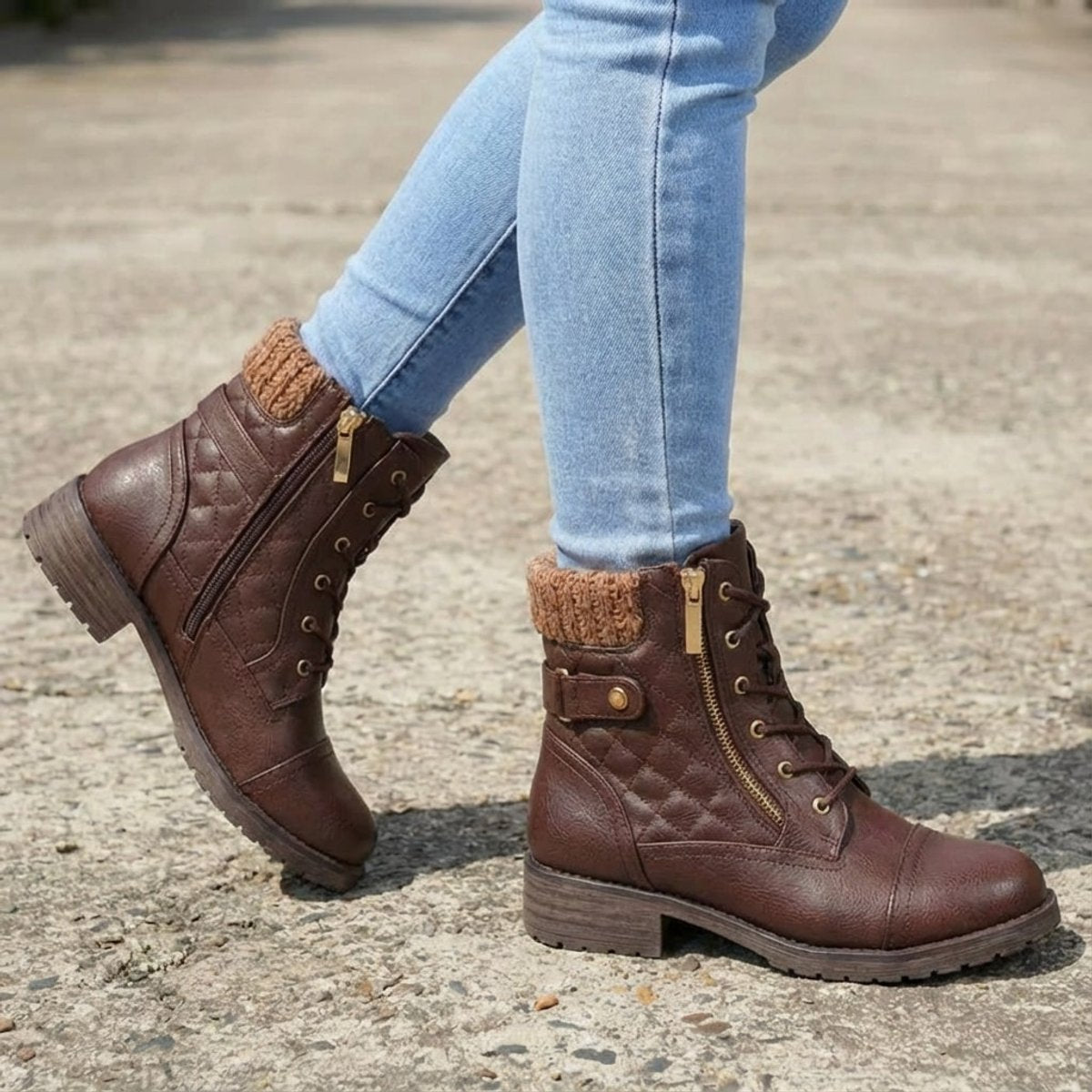 Brown quilted ankle boots featuring a ribbed knit cuff, side zip closure, lace-up front, and a low block heel.