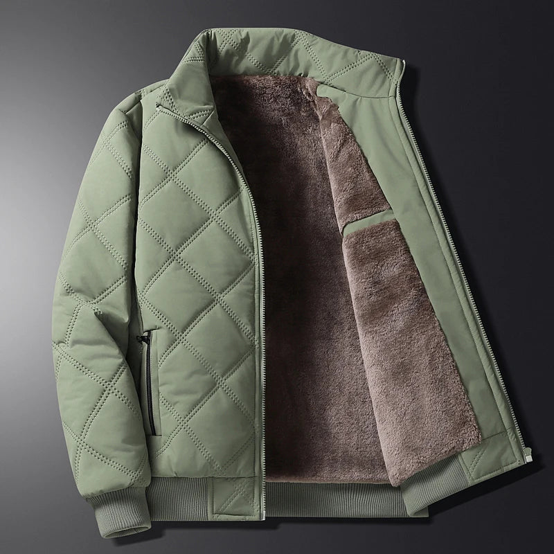 Men's sage green quilted jacket with a warm fleece lining, stand collar, and full-zip front displayed open.
