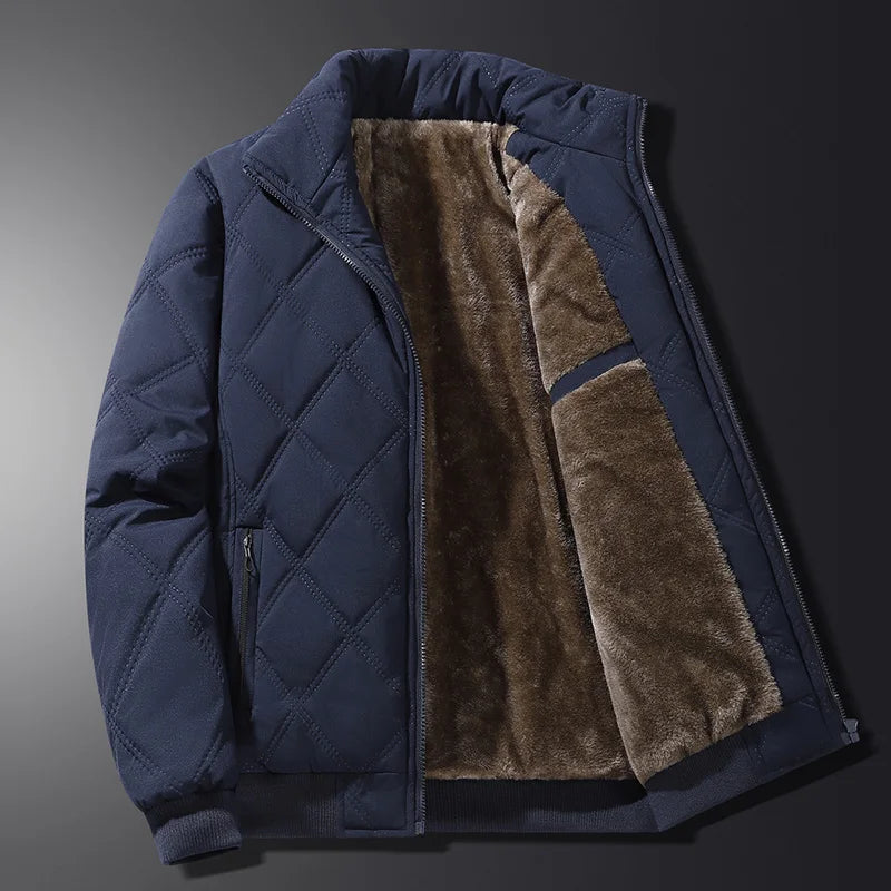 Men's navy quilted winter jacket with a soft fleece lining, stand collar, and zip-up front displayed open.