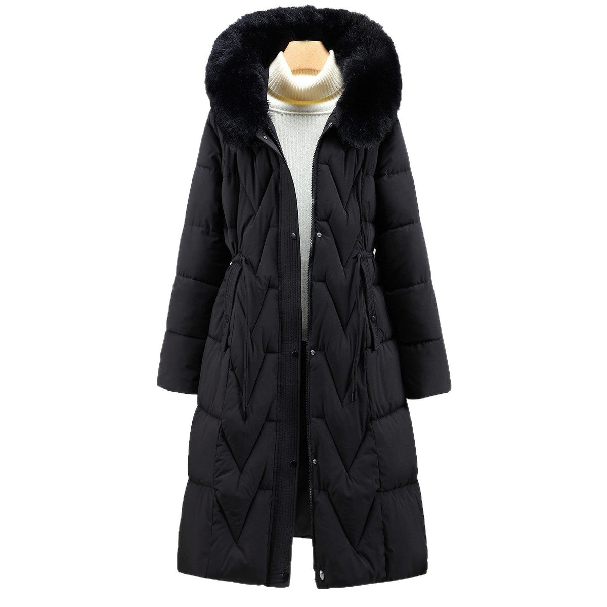 Black Chevron-Quilted Longline Puffer Coat shown from the front, highlighting the plush-trimmed hood, quilted panels, drawstring waist, and full-length closure.