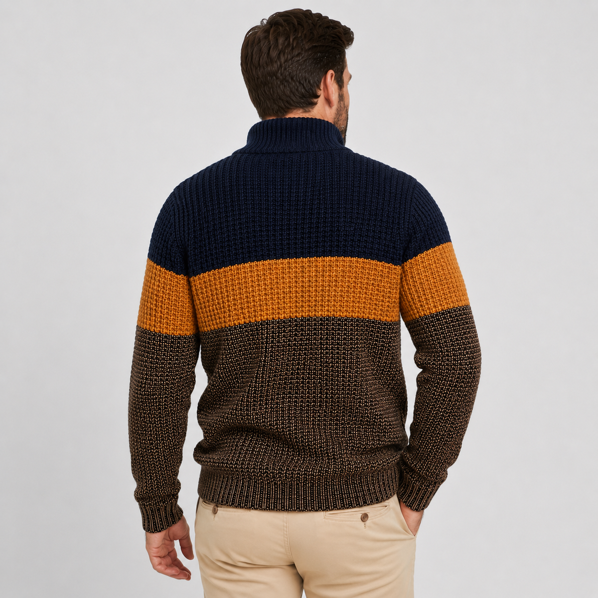 Navy, mustard, and brown colorblock quarter-zip sweater worn by a male model, shown from the back