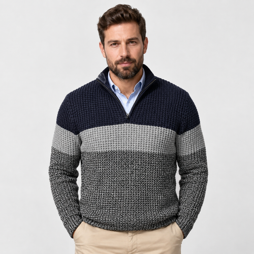Navy and gray chunky knit quarter-zip sweater worn by a male model, featuring colorblock stripes and a stand collar.