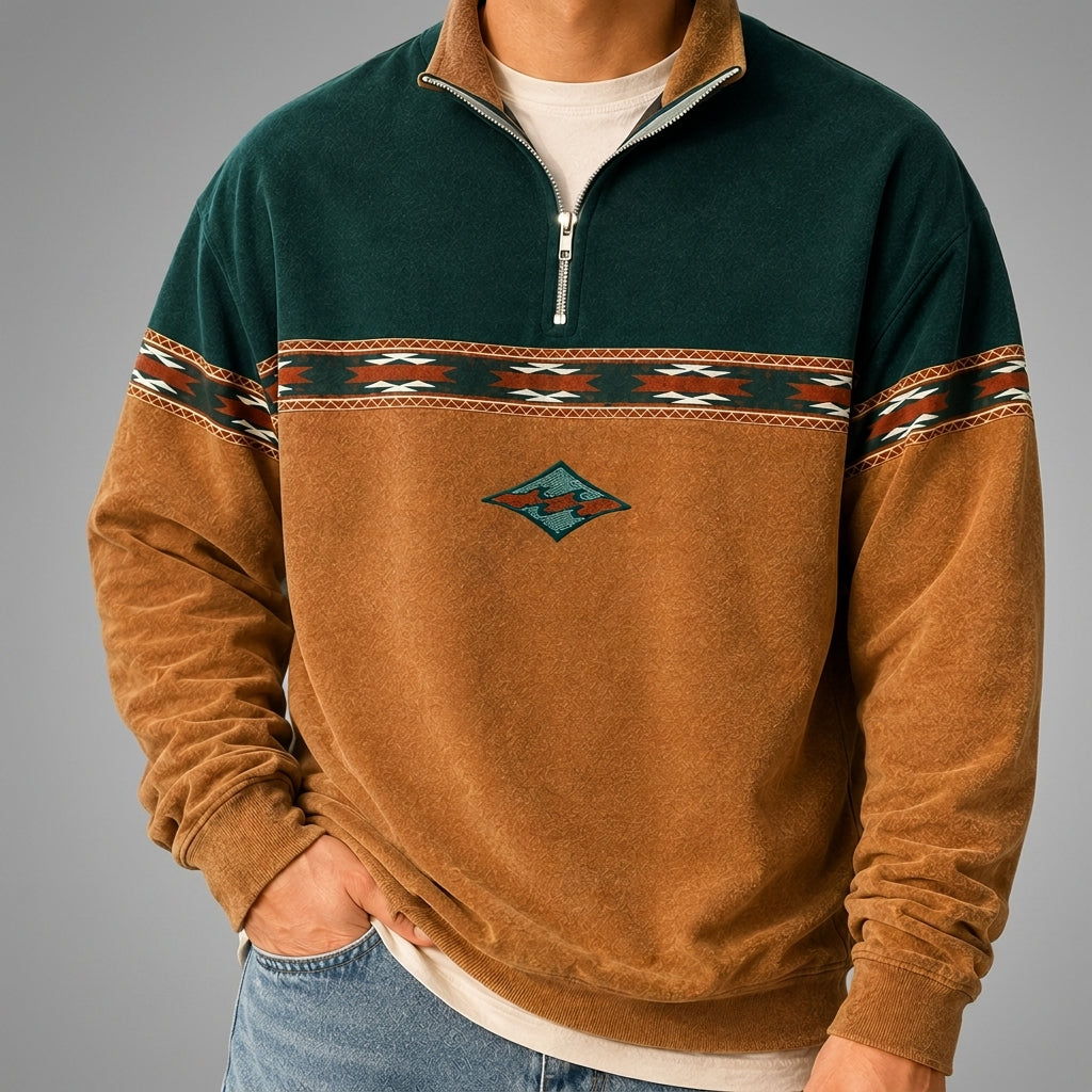 Teal and mustard colorblock quarter-zip pullover worn by a male model, shown from the front.