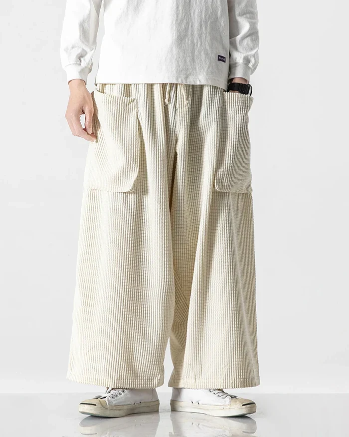 Cream wide-leg corduroy cargo pants with large front pockets