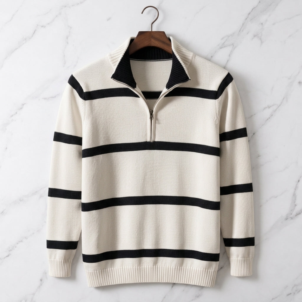 Cream cotton knit quarter-zip sweater with black contrast stripes shown on a hanger.