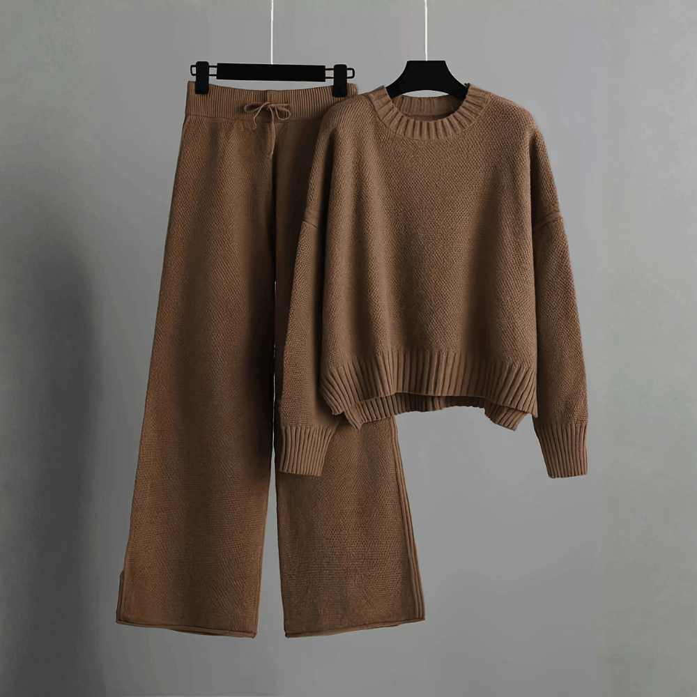 Product hanging view of the crewneck knit sweater and drawstring wide-leg pants set in rich dark brown.