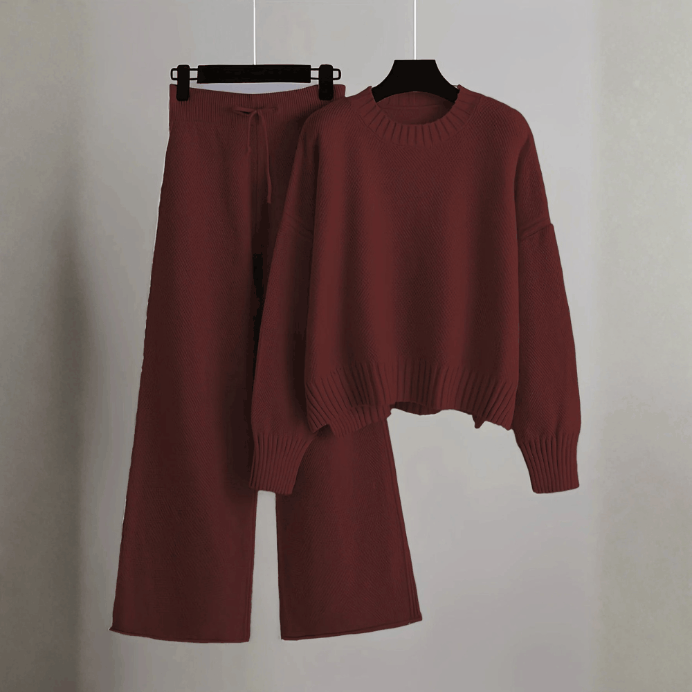 Product hanging view of the crewneck knit sweater and drawstring wide-leg pants set in deep wine burgundy.