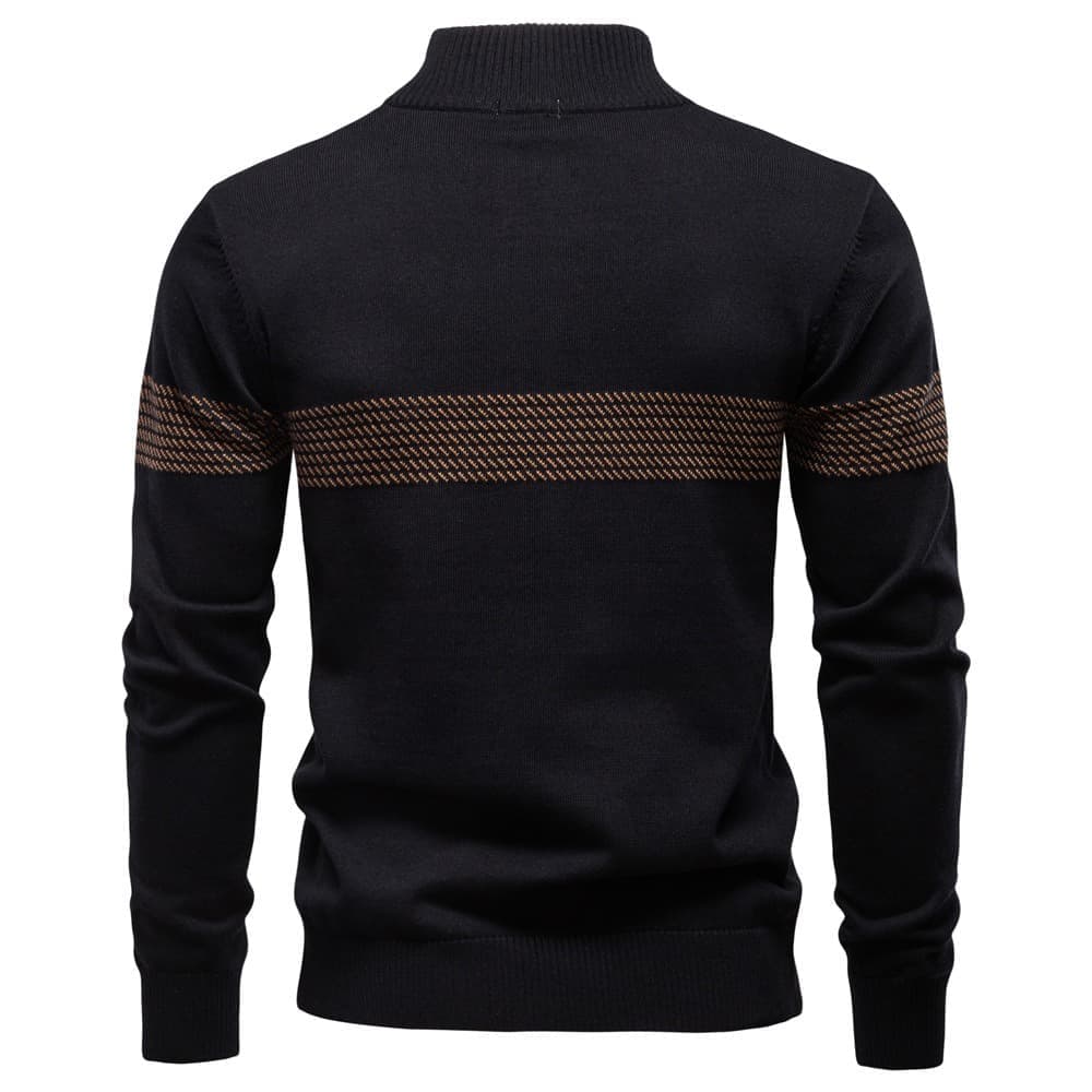 Back view of a navy quarter-zip knit sweater featuring a textured upper back panel, stand collar, and ribbed hem.