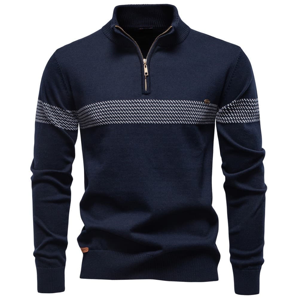 Navy quarter-zip knit sweater with a textured chest stripe, stand collar, and ribbed cuffs on a white background.