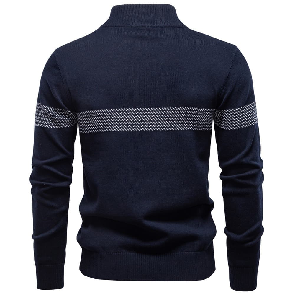 Back view of a navy quarter-zip knit sweater with a textured upper back panel and ribbed cuffs on a white background.