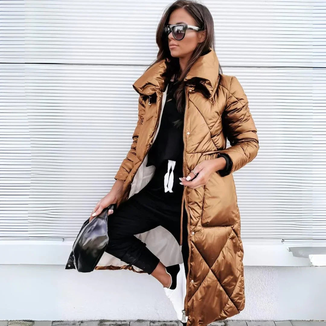 Khaki brown diamond-quilted longline puffer coat with a high-shine finish, oversized funnel collar, and snap-front placket.