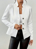 White cotton-blend short coat featuring an embossed geometric texture, stand collar, and button-front tailored fit.