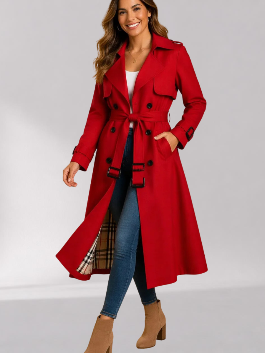 Red Double-Breasted Belted Longline Trench Coat worn by a female model, featuring a storm flap, epaulets, strap cuffs, and belted waist.