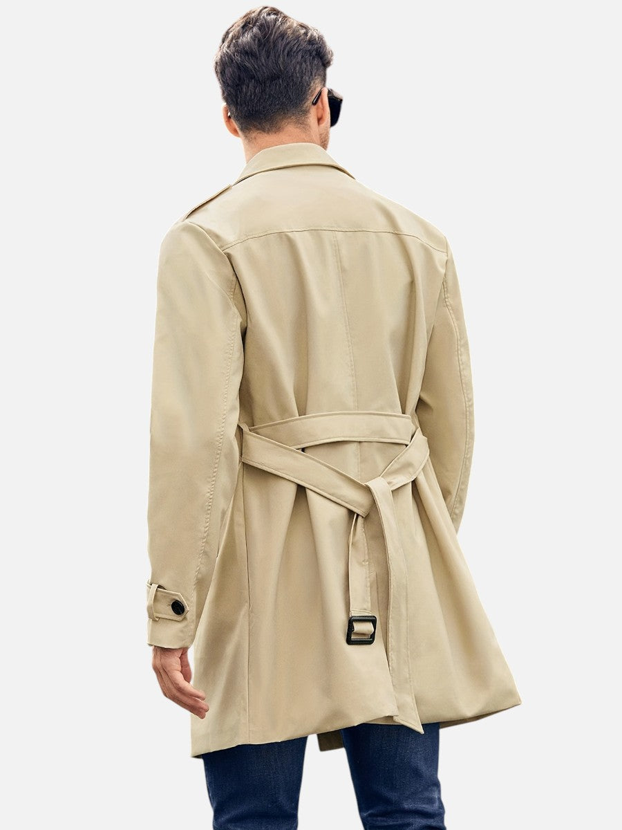 Back view of the beige Double-Breasted Lined Trench Coat, highlighting the buckle back belt, rear storm flap, and longline silhouette.
