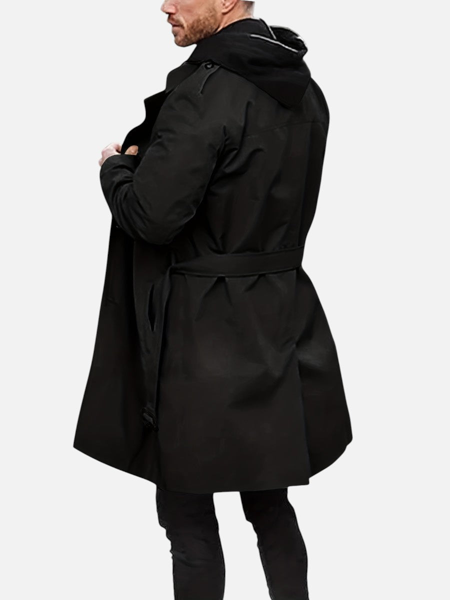 Back view of the black Double-Breasted Lined Trench Coat, highlighting the buckle back belt, rear storm flap, and longline silhouette.