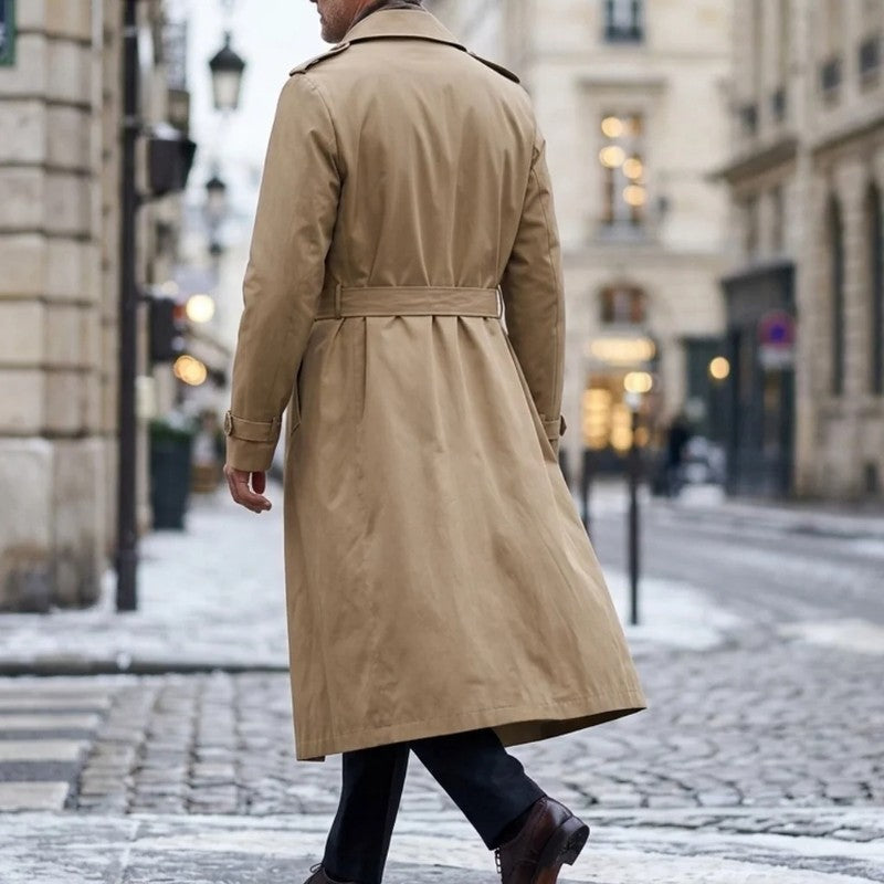 Back view of the beige Double-Breasted Longline Trench Coat, highlighting the longline silhouette, belted waist, and smooth woven lining.