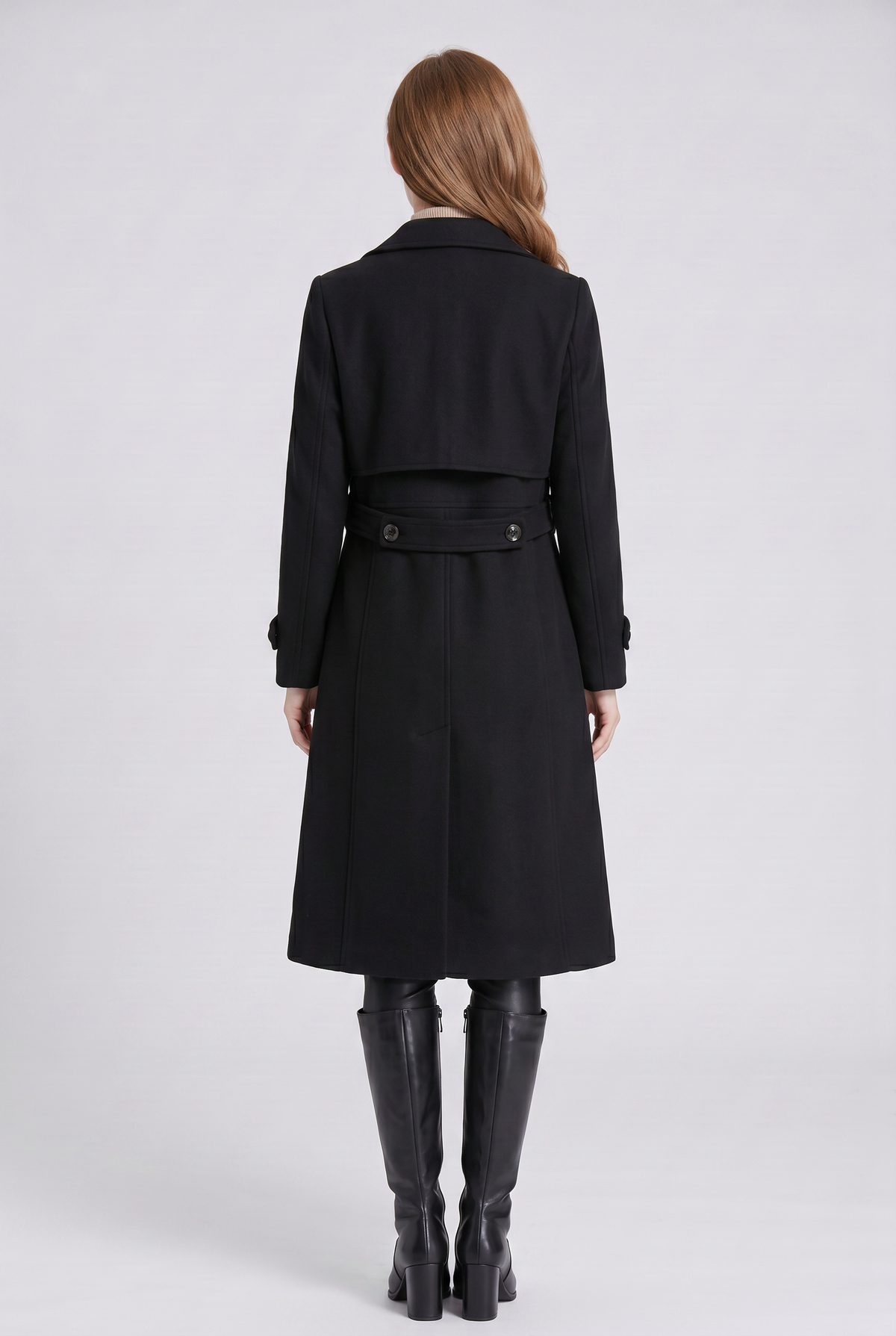 Back view of the black Double-Breasted Midi Trench Coat, highlighting the half-belt back, longline silhouette, and structured shoulders.