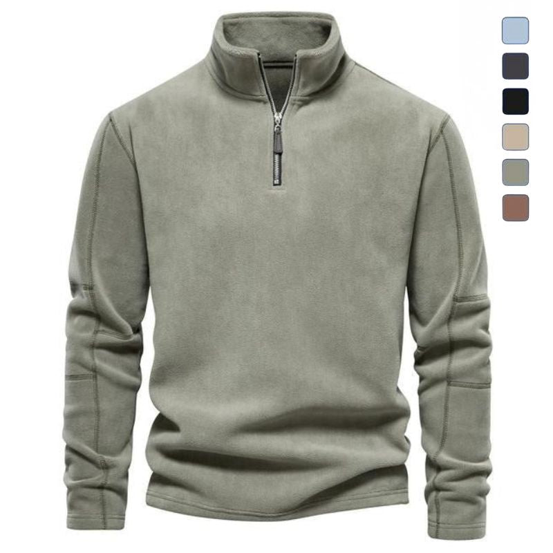 Sage green quarter-zip fleece pullover featuring a stand collar, long sleeves, and a relaxed fit on a white background.