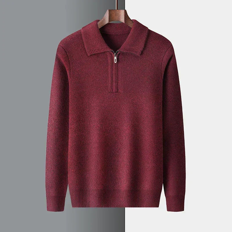 Burgundy mid-weight knit quarter-zip sweater with a folded point collar and ribbed cuffs on a wooden hanger.