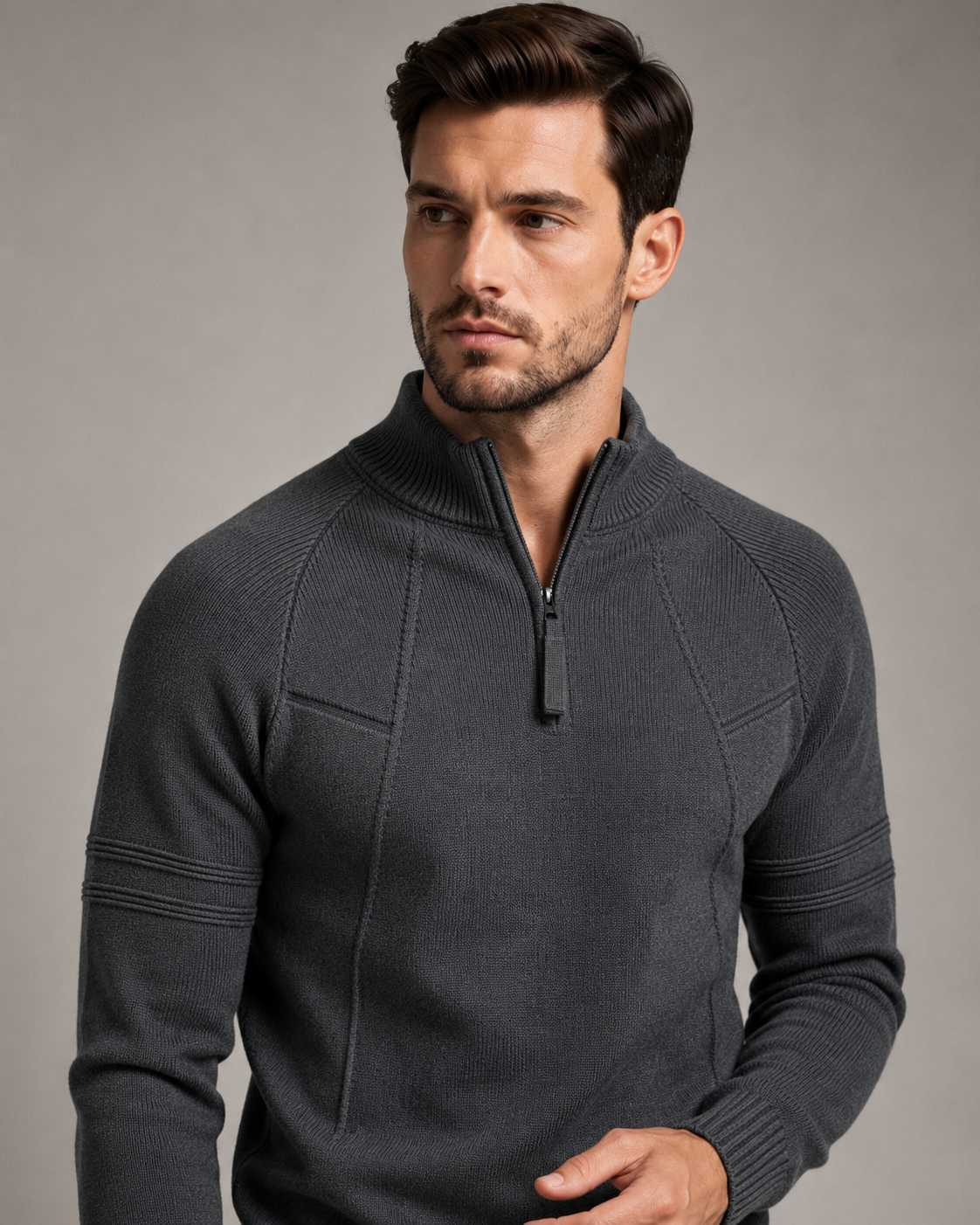 Dark gray fitted quarter-zip sweater worn by male model, front view
