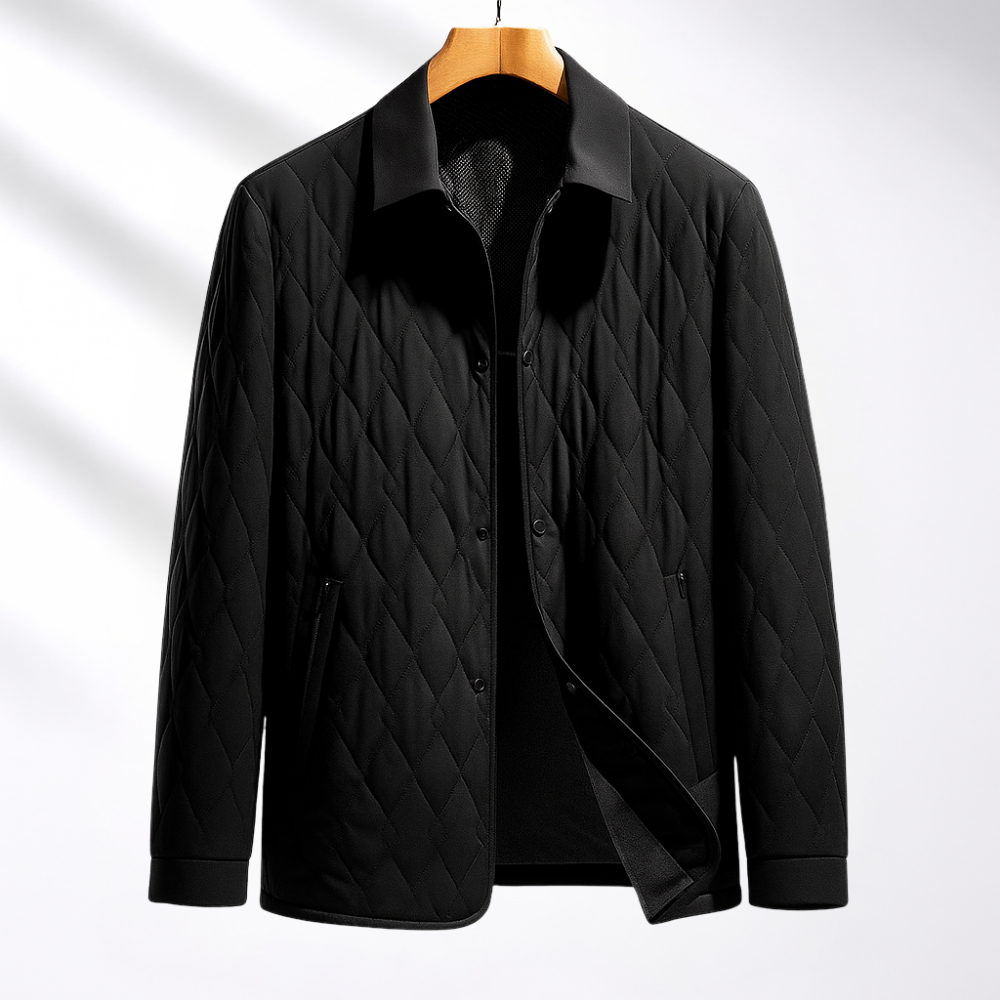 Black diamond-stitch quilted jacket with a turn-down collar, button front, and plush lining on a wooden hanger.