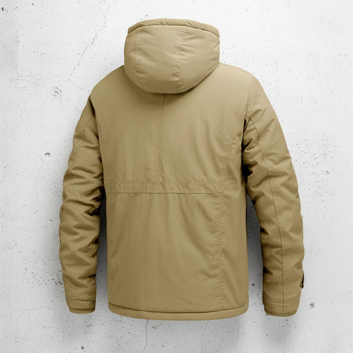 Khaki fleece-lined utility jacket featuring a detachable hood and hip-length fit against a textured concrete wall.