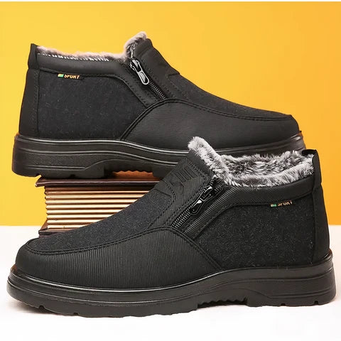 Black fleece-lined winter boots featuring a side zipper, plush collar, and durable traction sole on a yellow background.