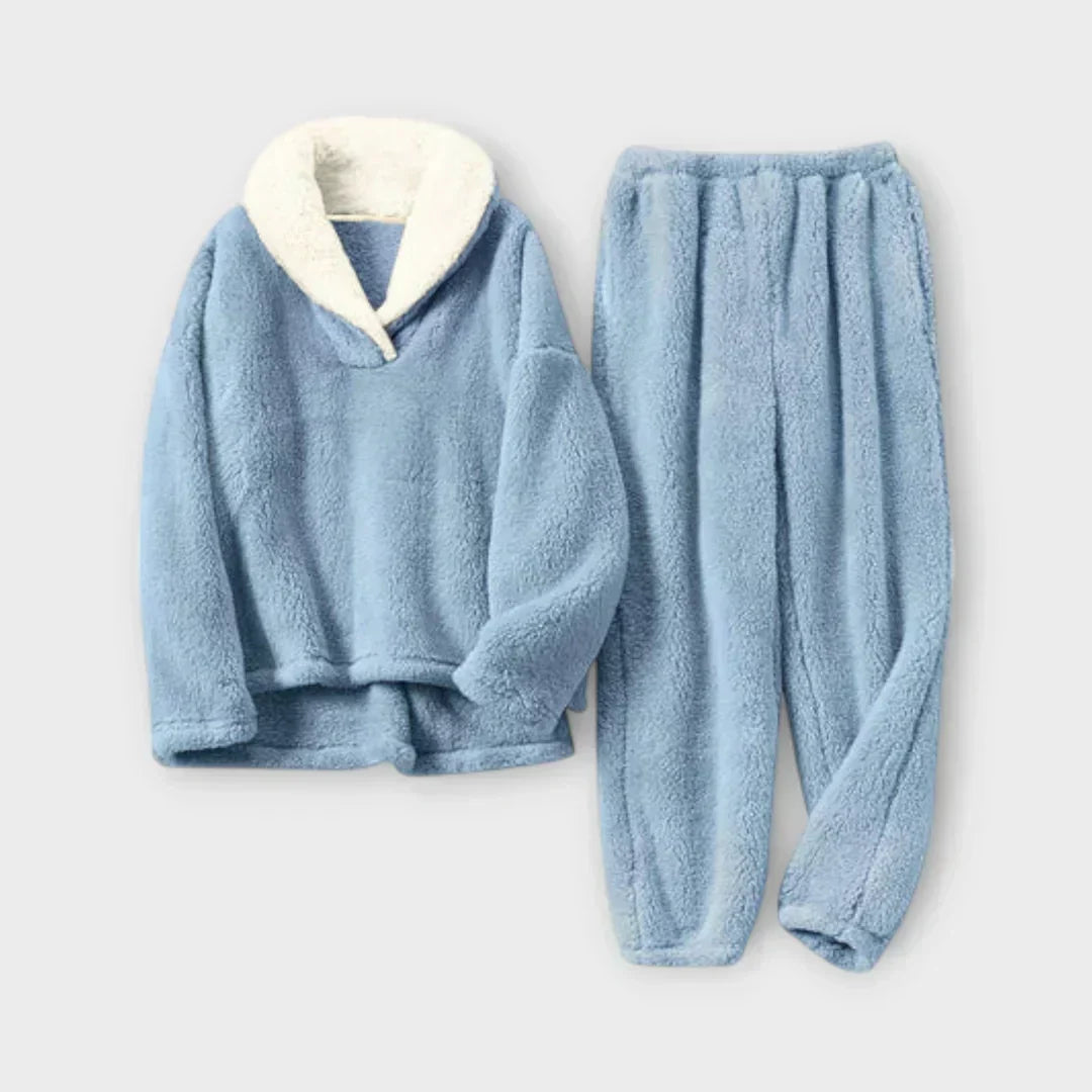 Product flat-lay view of the plush fleece lounge set in sky blue with a cream white contrast sherpa collar pullover and matching fleece joggers.