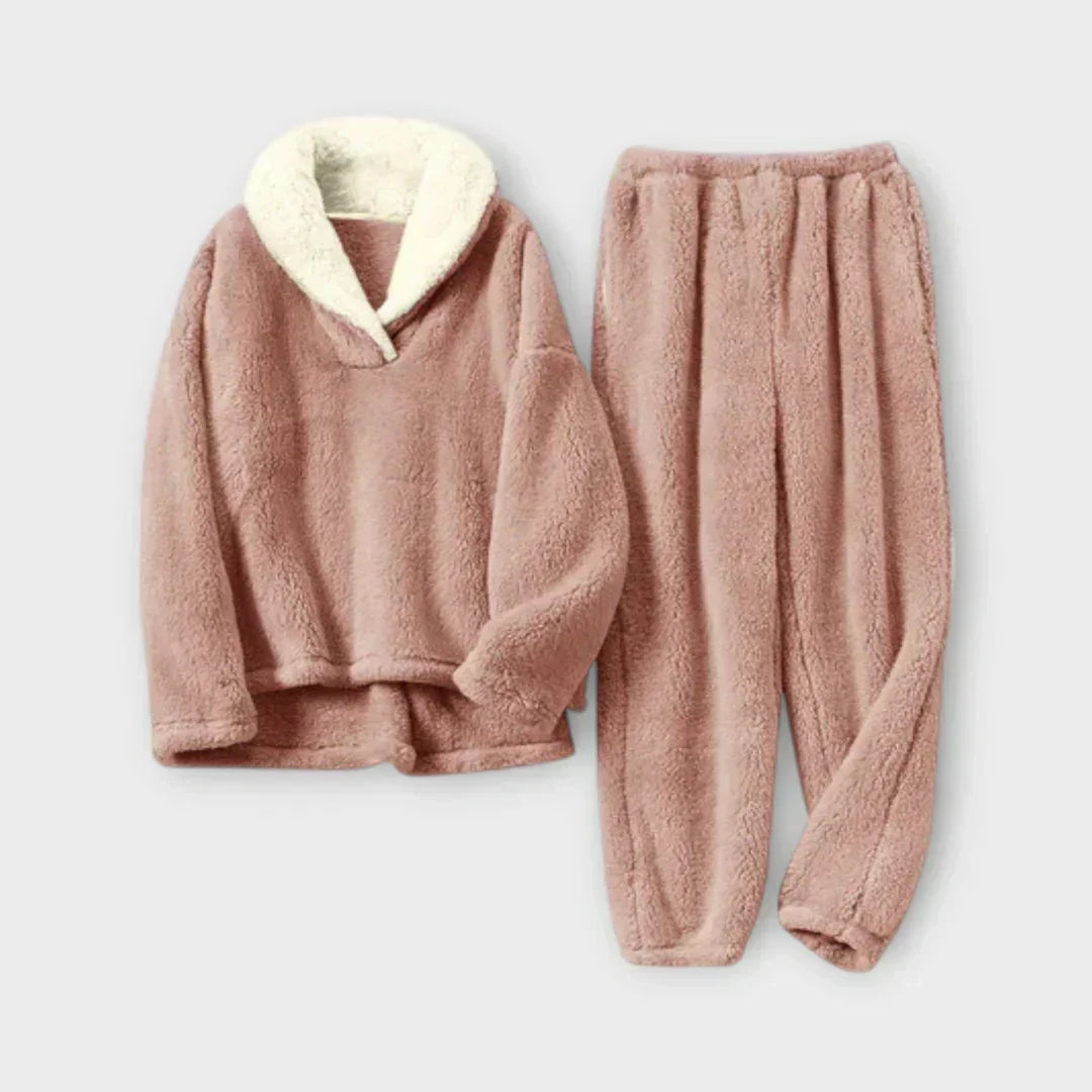 Product flat-lay view of the plush fleece lounge set in dusty rose pink with a white sherpa lapel collar sweater and elastic-waist joggers.