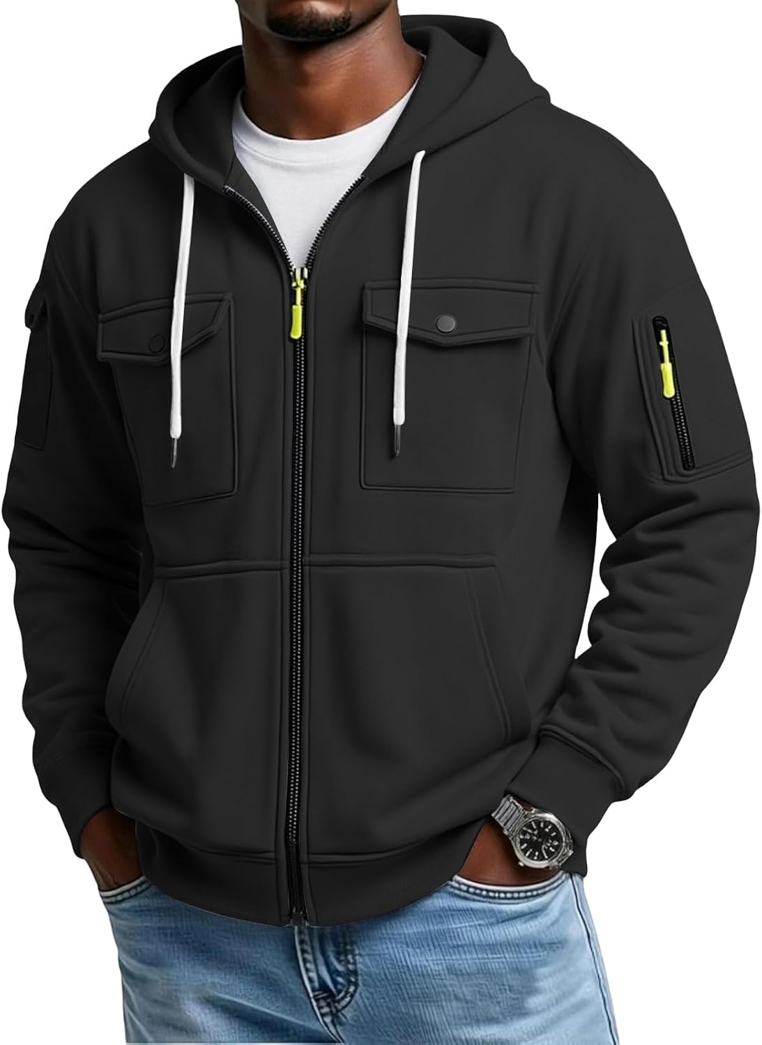 Black full-zip utility hoodie worn by a male model, shown from the front with snap-flap chest pockets and sleeve utility pockets.