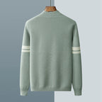 Sage green wool-blend cardigan featuring a structured silhouette and contrasting white stripes on the sleeves.