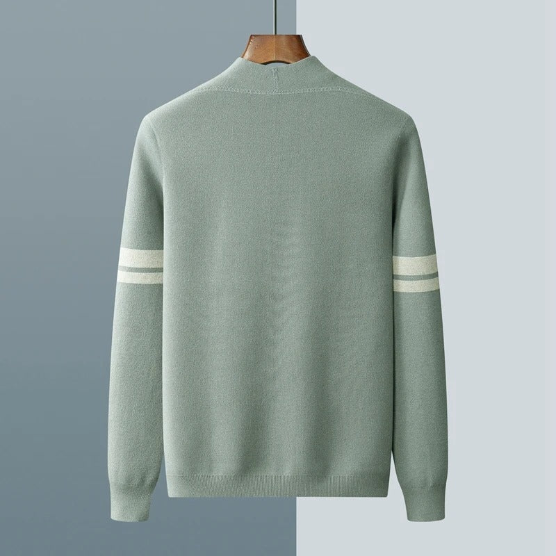 Sage green wool-blend cardigan featuring a structured silhouette and contrasting white stripes on the sleeves.