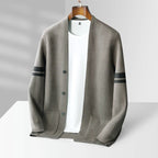 Taupe wool-blend V-neck cardigan with sleeve stripes, front buttons, and patch pockets on a wooden hanger.
