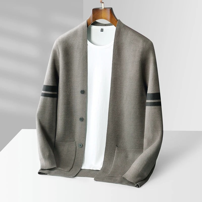 Taupe wool-blend V-neck cardigan with sleeve stripes, front buttons, and patch pockets on a wooden hanger.