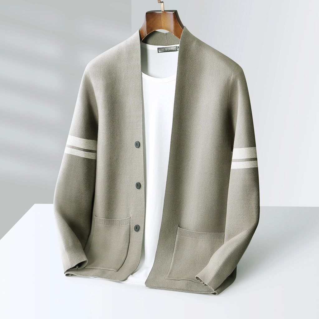 Taupe wool-blend V-neck cardigan with sleeve stripes, button front, and front pockets, layered over a white shirt.