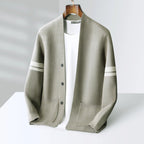 Taupe wool-blend V-neck cardigan with sleeve stripes, button front, and front pockets, layered over a white shirt.
