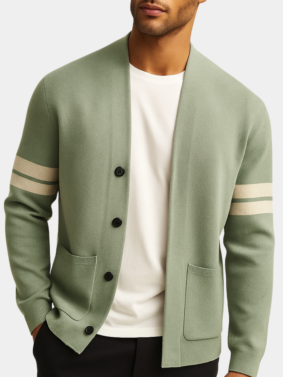 Sage green wool-blend V-neck cardigan featuring contrast sleeve stripes, black buttons, and front patch pockets.