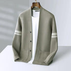 Sage green wool-blend V-neck cardigan with sleeve stripes, button front, and patch pockets on a white background.