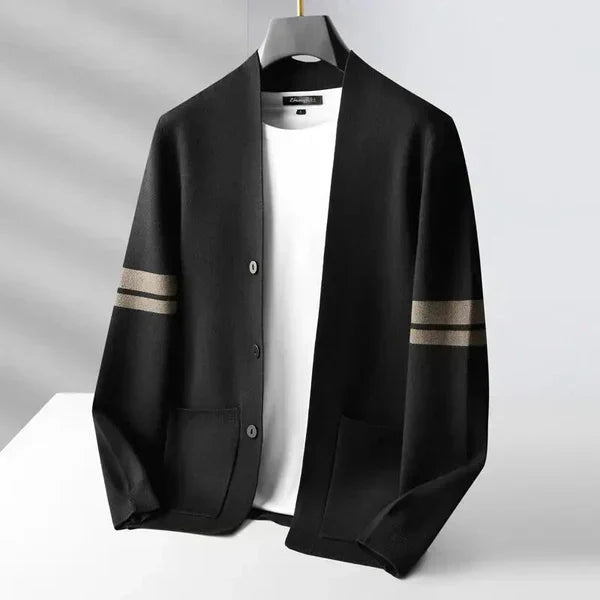 Black wool-blend V-neck cardigan with sleeve stripes, button front, and patch pockets on a white undershirt.