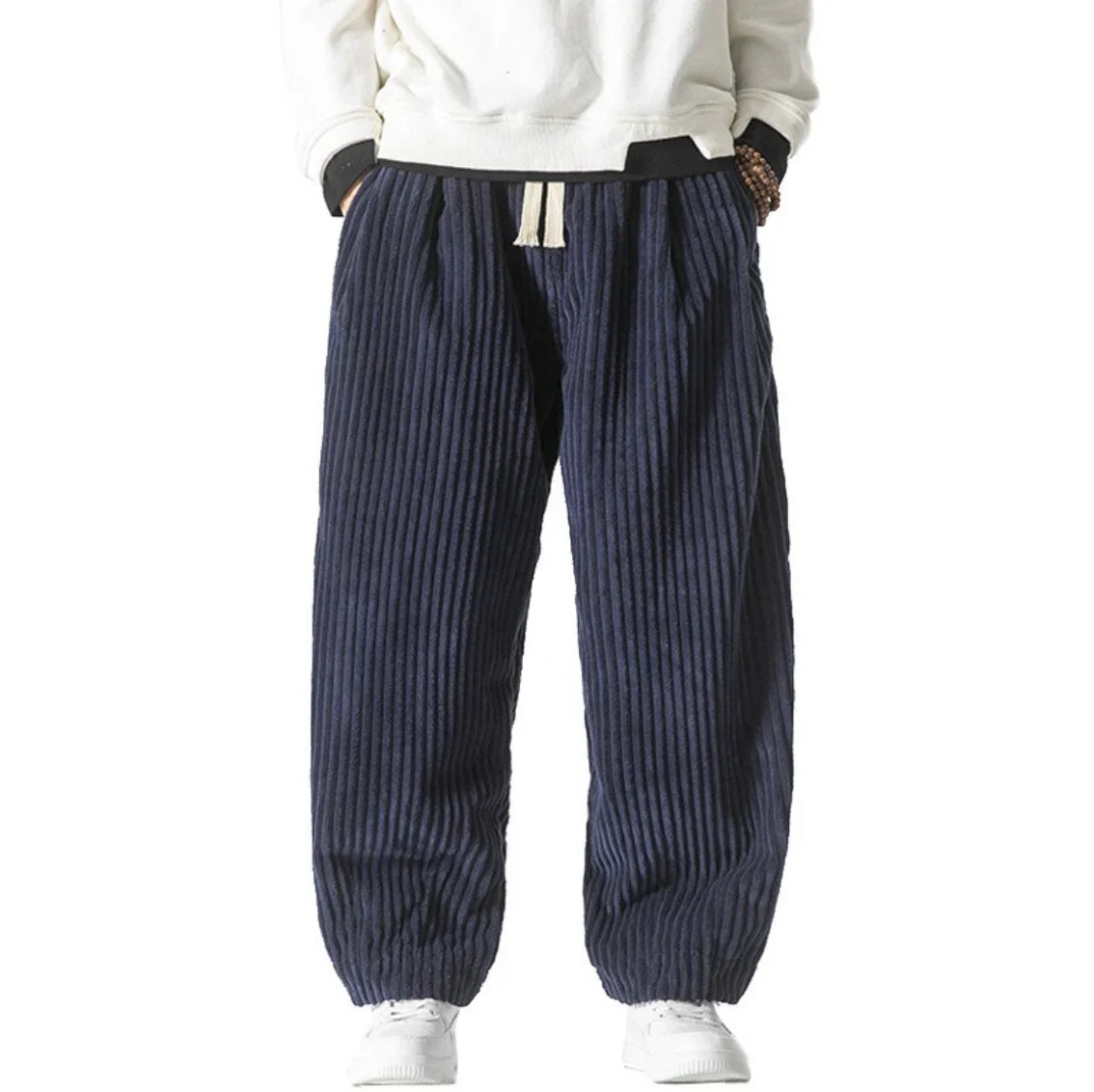 Blue gathered-cuff corduroy pants with wide-leg fit and drawstring waist